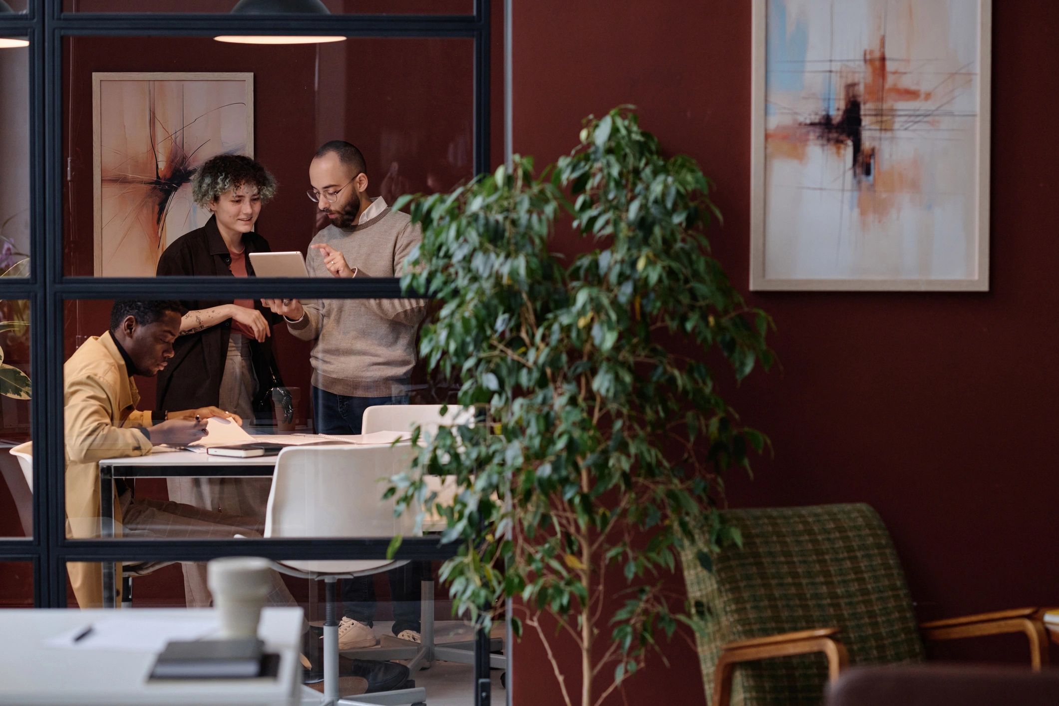 Real estate advisors discussing property options in a modern office